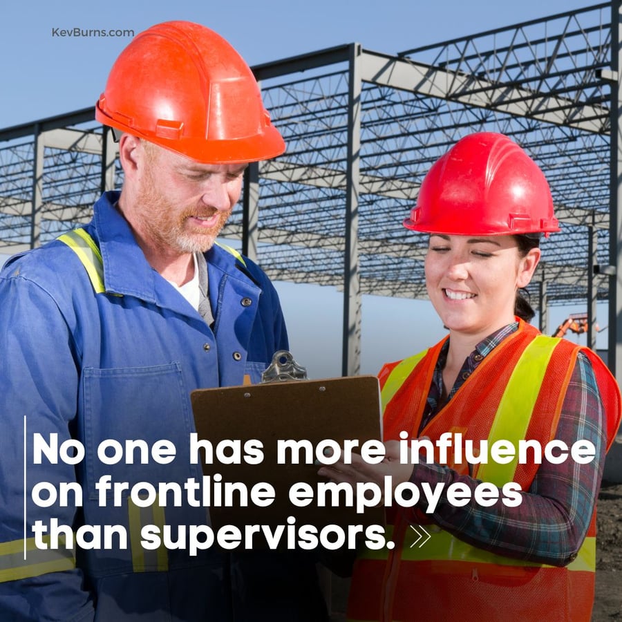 supervisor speaks with worker to reinforce a strong workplace culture